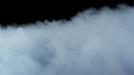 Photo of Realistic Clouds, Smoke, Dry Ice Smoke Texture on black dark Background. For website background, print wallpapers, office or design element, posters and more.の写真素材