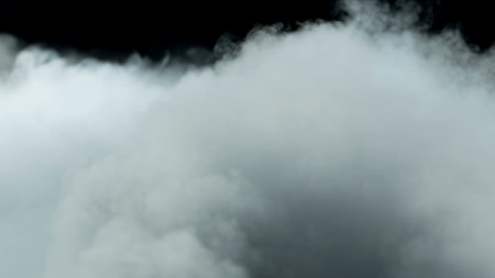 Photo of Realistic Clouds, Smoke, Dry Ice Smoke Texture on black dark Background. For website background, print wallpapers, office or design element, posters and more.の写真素材