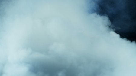 Photo of Realistic Clouds, Smoke, Dry Ice Smoke Texture on black dark Background. For website background, print wallpapers, office or design element, posters and more.の写真素材