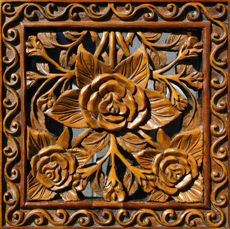 Fragment of carved wood decorative panel : can be used as background or textureの写真素材