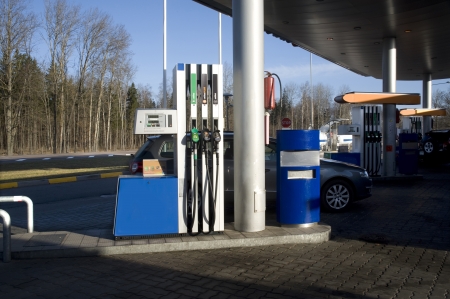 Filling station  Filling of cars by fuel のeditorial素材