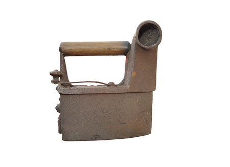 The ancient iron heated by means of coals.の写真素材