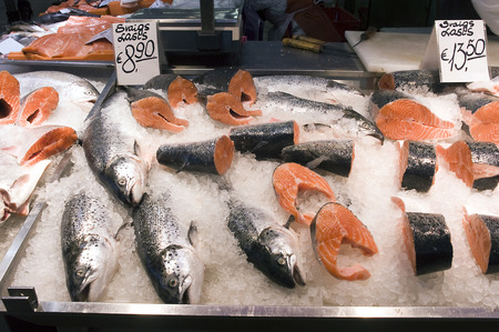 Latvia, Riga. Sale of a salmon in fish pavilion on a market.の写真素材