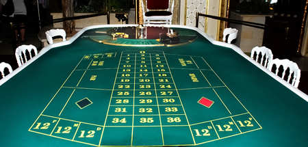 Casino. A table for the European roulette covered with green felt.の写真素材