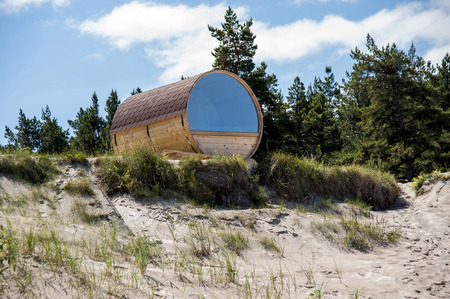 Europe, Latvia, Cape Kolka. House in the form of a barrel on the dunes for a double stay at the coast of the Baltic Sea.の写真素材
