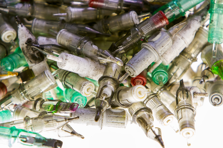 a large number of used with traces of paint cartridges for tattoo machines.の写真素材