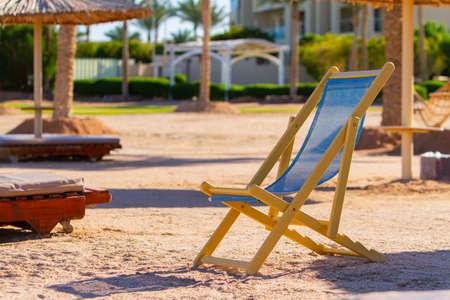 lonely empty sun lounger on the Red Sea beach, evening, winter Sharm El Sheikh, Egyptの写真素材