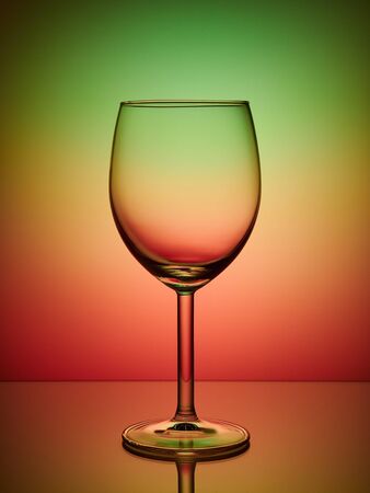 Glass close-up neon colored light gradient backgroundの写真素材
