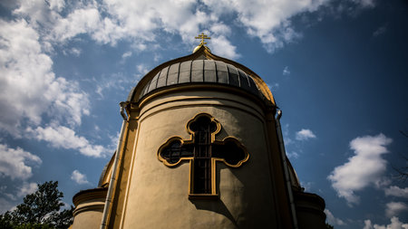 Gazing upwards at a beautiful church that has a cross on its top