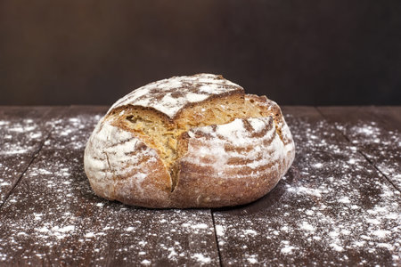 fresh traditional bread on a wooden table