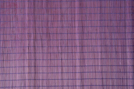 Purple baboo placemats as a backgroundの写真素材