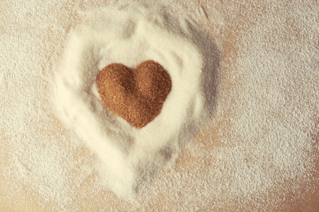 Vintage style photo. Valentines Day, heart made of brawn sugar の写真素材