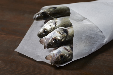 fresh fish, sea bass, ready for cookingの写真素材