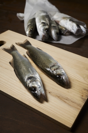 fresh fish, sea bass, ready for cookingの写真素材