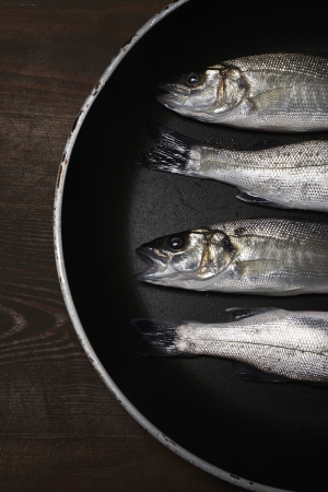 fresh fish, sea bass, ready for cookingの写真素材