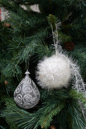 Closeup of Christmas ornaments on the Christmas treeの写真素材