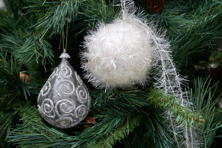 Closeup of Christmas ornaments on the Christmas treeの写真素材