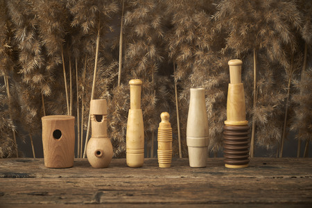 duck decoys and whistles for birds in the reedsの写真素材