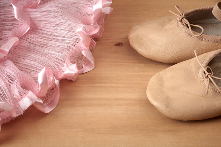 pair of ballet shoes on wooden floor
の写真素材