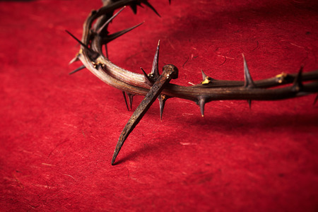 Jesus Christ crown of thorns and a nail の写真素材