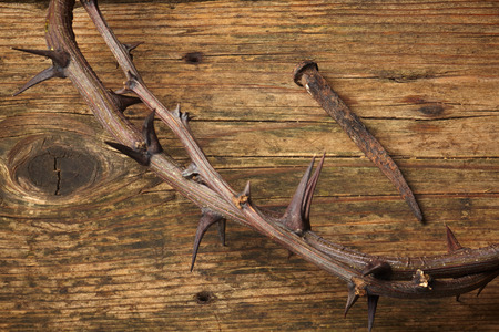 Jesus Christ crown of thorns and a nailの写真素材