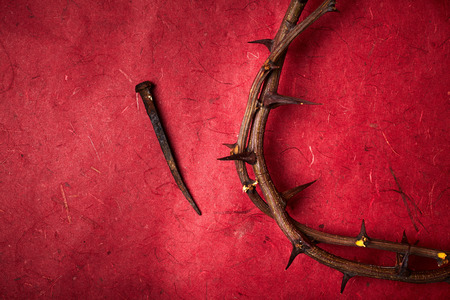 Jesus Christ crown of thorns and a nail の写真素材