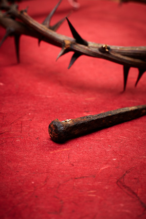Jesus Christ crown of thorns and a nail の写真素材