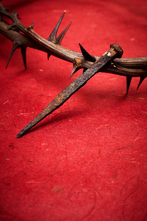 Jesus Christ crown of thorns and a nailの写真素材