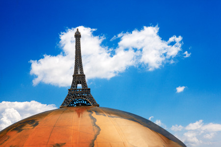 Travel to Paris. Eiffel tower on the top of the earth under blue sky.の写真素材