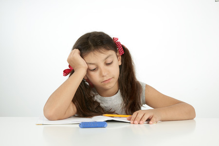 education and school concept. Girl trying to find the answer.の写真素材