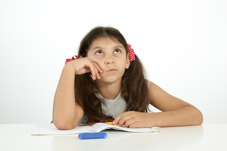 education and school concept. Girl trying to find the answer.の写真素材