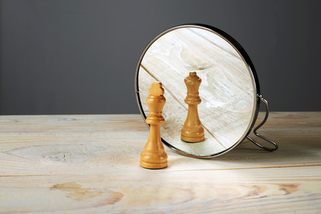 Man or Woman. Queen and king chessmen mirroring.の写真素材