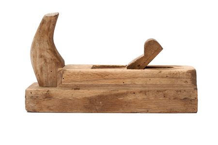 Woodworking tool. Traditional wooden hand plane isolated on a white backgroundの写真素材