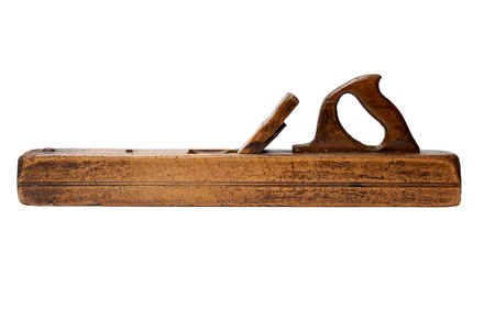 Woodworking tool. Traditional wooden hand plane isolated on a white backgroundの写真素材