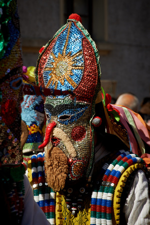 SHIROKA LAKA, BULGARIA - MARCH 5: People dressed in traditional costumes called Kukeri celebrate arrival of Spring with ritual dances in Shiroka Laka, Bulgaria, on March 5, 2017.のeditorial素材