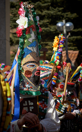 SHIROKA LAKA, BULGARIA - MARCH 5: People dressed in traditional costumes called Kukeri celebrate arrival of Spring with ritual dances in Shiroka Laka, Bulgaria, on March 5, 2017.のeditorial素材