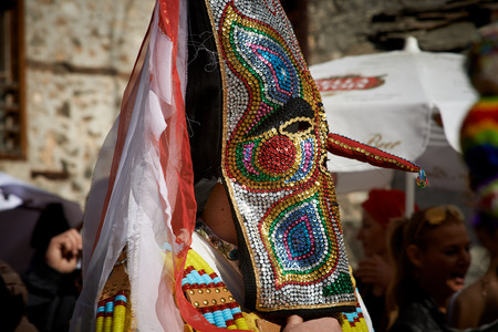 SHIROKA LAKA, BULGARIA - MARCH 5: People dressed in traditional costumes called Kukeri celebrate arrival of Spring with ritual dances in Shiroka Laka, Bulgaria, on March 5, 2017.のeditorial素材