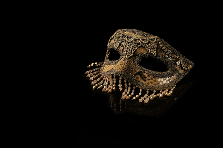 venetian carnival mask on black backgroundの写真素材