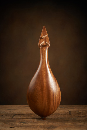 Traditional Greek instrument called Thrakian lyra on wooden backgroundの写真素材