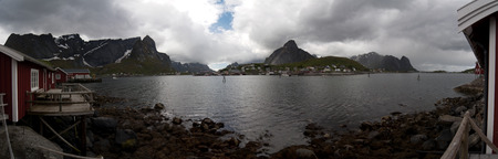 Norwegian nature There are mountains plunging into the sea from hundreds of metres, fjords, tall mountain peaks, northern lights and midnight sun.の写真素材