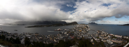 Norwegian nature. There are mountains plunging into the sea from hundreds of metres, fjords, tall mountain peaks, northern lights and midnight sun.の写真素材