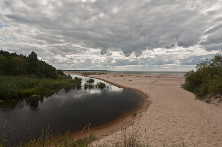The White Dune is one of the landmarks of Saulkrasti, on the Vidzeme gulf coast. The dune offers a splendid view of the sea, the mouth of the Incupe River and the vast beach.の写真素材