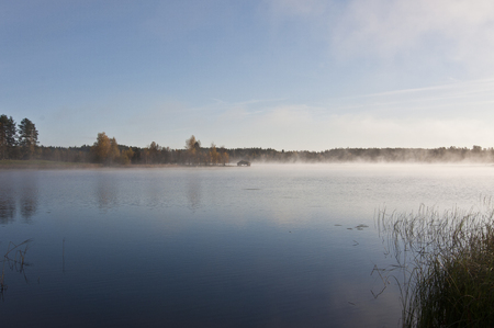 fog on the water, early morning nature scene, fog on the lakeの写真素材