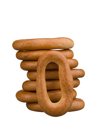 Tasty bread rings stack isolated on white backgroundの写真素材