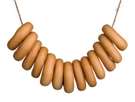 Sheaf of tasty bagels isolated on white backgroundの写真素材