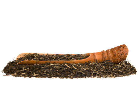 Green tea brew with bamboo root scoop isolated on white backgroindの写真素材