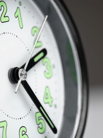 clock closeup with shallow DOF, useful for various time related themesの写真素材