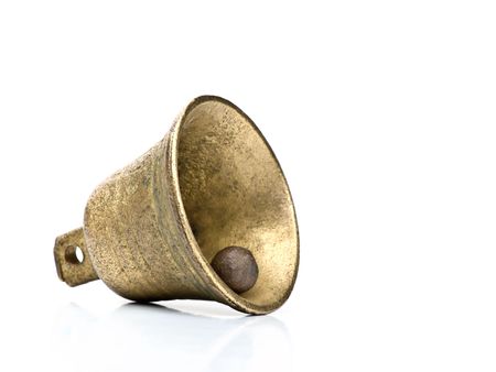 old bell over white background with copy spaceの写真素材