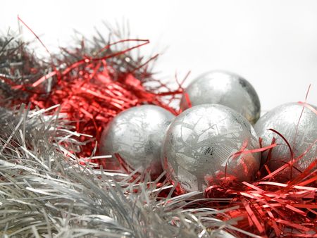 Christmas decoration balls over white background, closeup, for various christmass related themes and backgroundsの写真素材