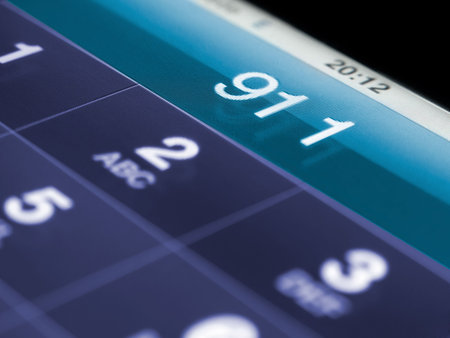 911 on the mobile phone,shallow DOF, for emergency and urgency themes